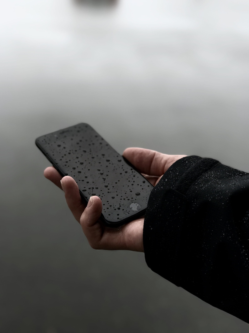 telephone, body part, adults only, day, human Hand, water, phone, business, text Messaging, smart Phone, outdoors, rain, wireless Technology, droplets