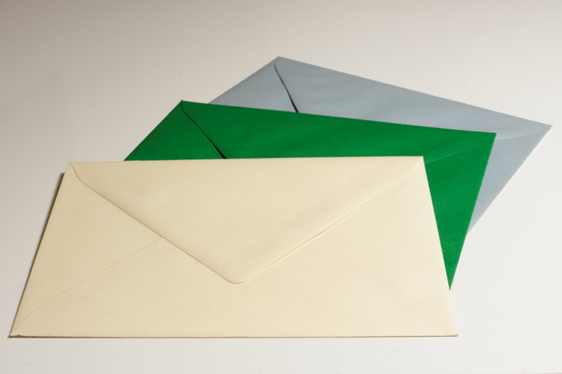 white background, copy space, no people, triangle shape, indoors, communication, three, send, green, 2K, correspondence, folded, studio shot, white, shape