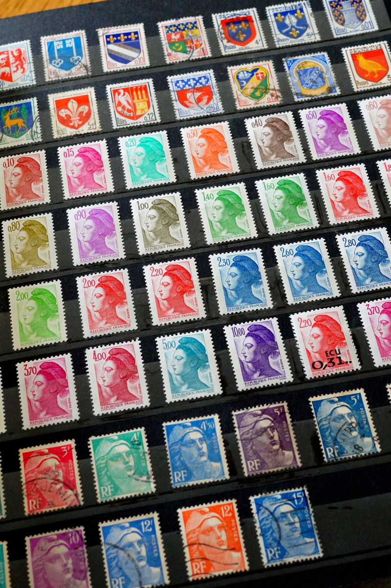 collection, indoors, philately, 5K, shape, pattern, in a row, design, high angle view, post, no people, choice, repetition, square shape, backgrounds
