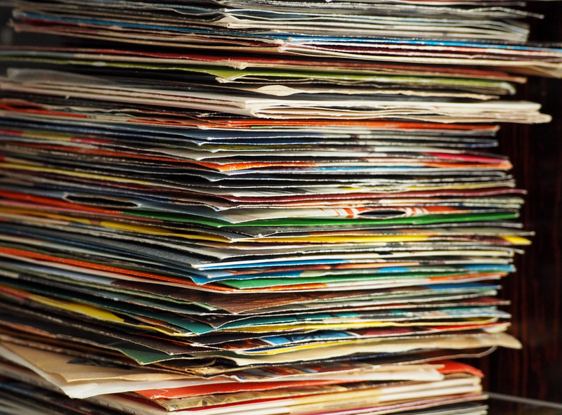 large group of objects, backgrounds, paper, multi colored, background, audio, nostalgic, book, still life, collection, stack, publication, sound, nostalgia