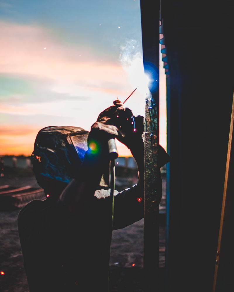 rod, welding, sunset, hand, bright, silhouette, technology, person, 2K, holding, sky, one person, human hand, work, light, lifestyles, flash, outdoors