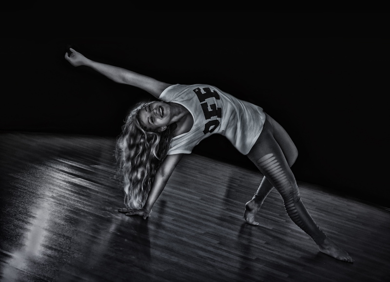 exercising, full length, one Person, muscular Build, hair, flooring, girl, smile, people, flexibility, hairstyle, adult, wearing, clothing, sport, human arm