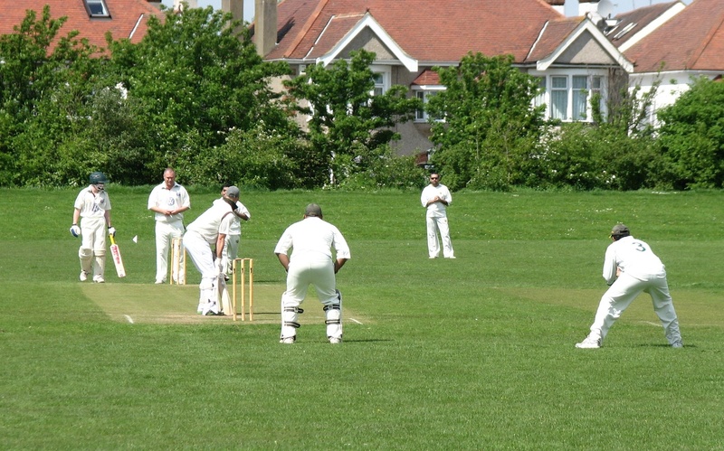playing, architecture, sport, green color, outdoors, men, cricket, growth, real people, game, people, day, grass, nature, 1080P, daytime, group of people