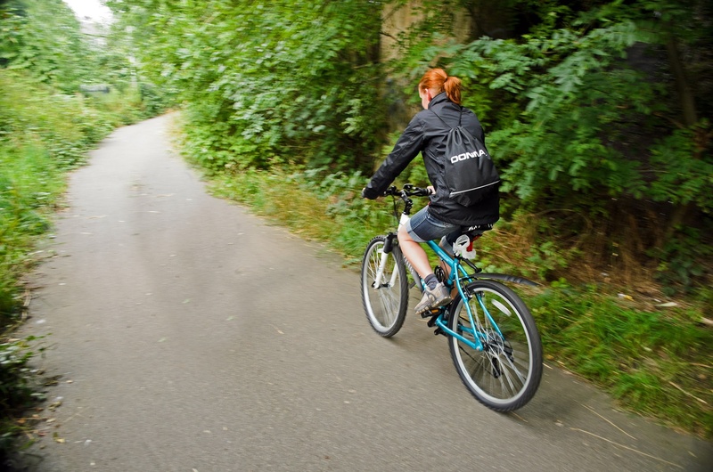 outside, lady, bicycle, summer, activity, ride, fit, main, sport, adult, hair, biking, jacket, walk, transportation, street, outdoors, on the move, lifestyles