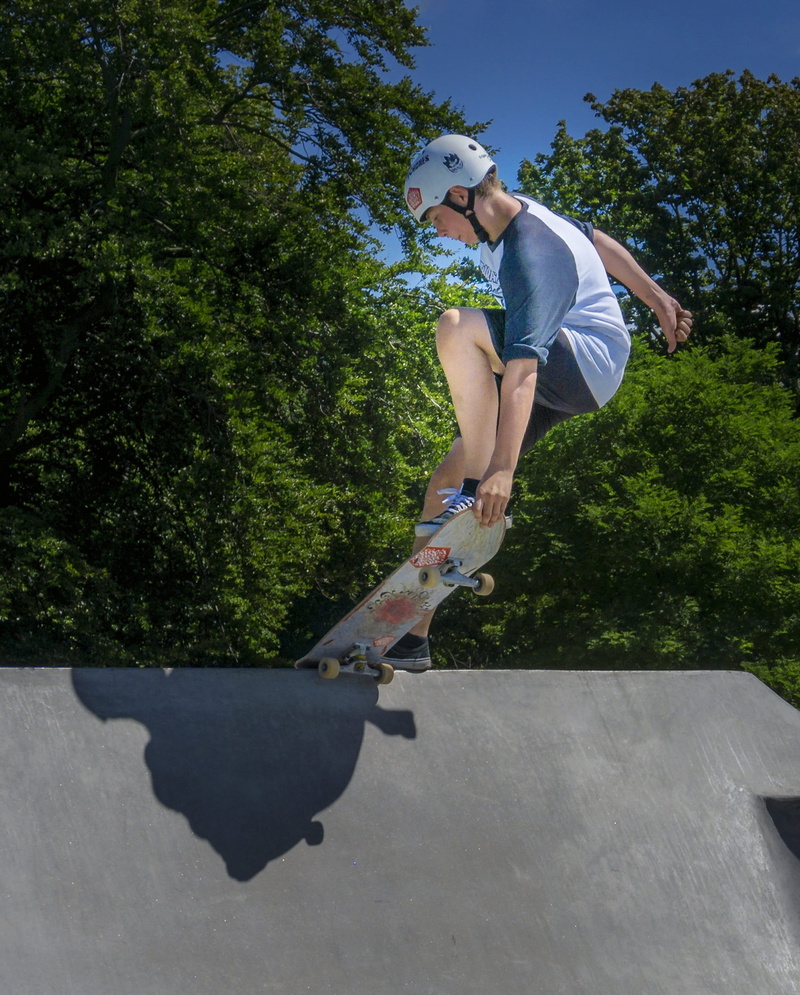 adult, train, variety, skateboard park, human, plant, sunlight, 1080P, mid-air, outdoors, board, sports equipment, funsport, jump, fitness, skateboard