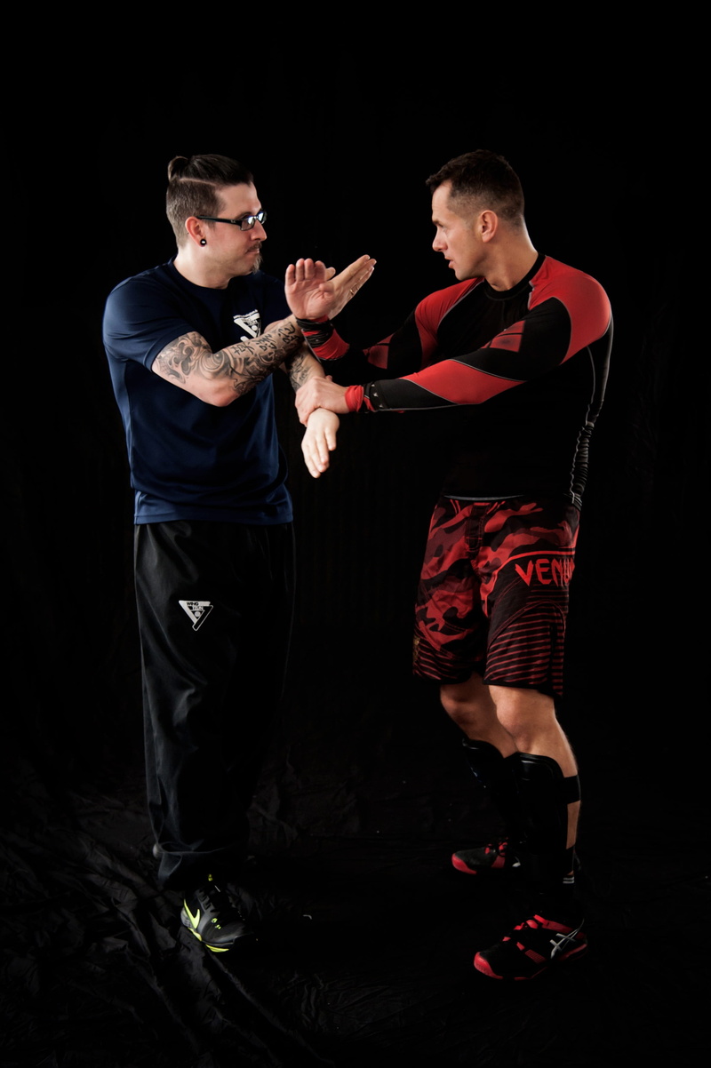 standing, attack, aggression, street fight, kung fu, two people, martial arts, casual clothing, males, 2K, men, black background, kamps port school, finger stitch