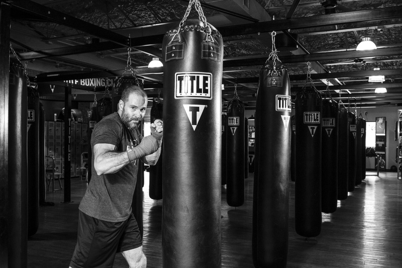 black, exercise, holding, architectural column, punching, indoors, adults only, real people, one person, boxer, athlete, training, men, heavy, fitness