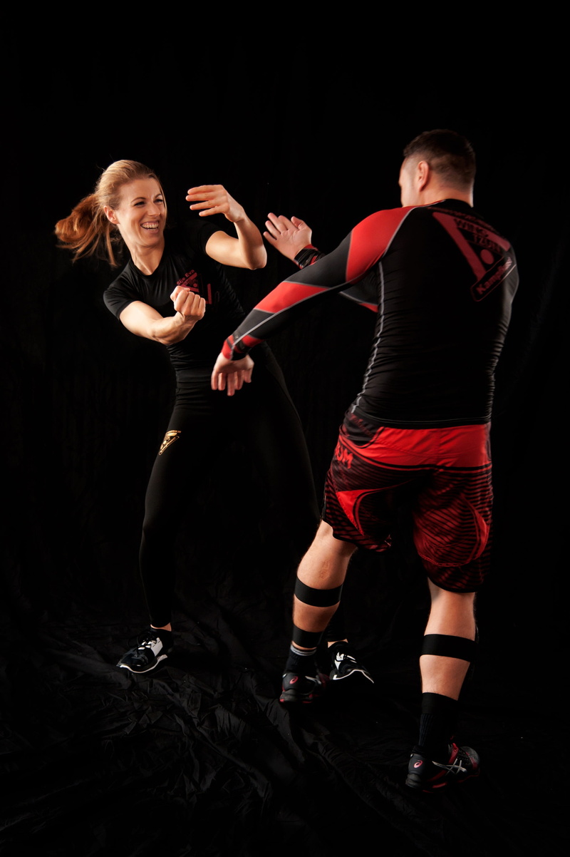 motion, studio shot, strength, lat sao, sporty, street fight, dancing, wing chun martel art, kick boxing, young women, two people, performance, 2K, black background