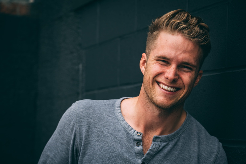 cool, casual Clothing, man fashion, satisfaction, blond, part Of, brown Hair, male, happy, indoors, standing, men, males, youth Culture, close-up, only Young Men