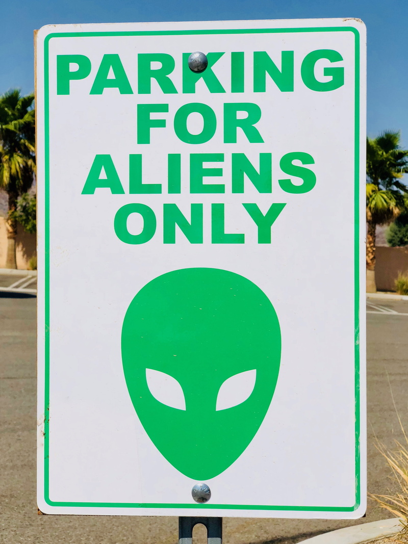warning, photo, warning sign, no people, parking, symbol, signalise, daylight, message, circle, green color, text, day, outdoors, western script, road warning sign