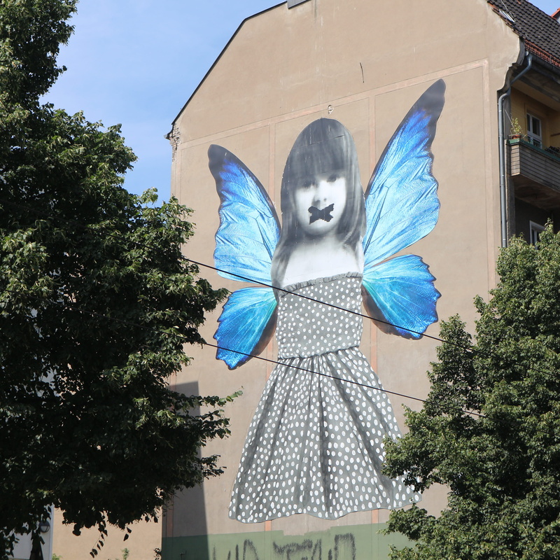 no people, building exterior, mural, plant, representation, tree, architecture, outdoors, graffiti, art, silence, urban art, blue, facade, sky, day, friedrichshain