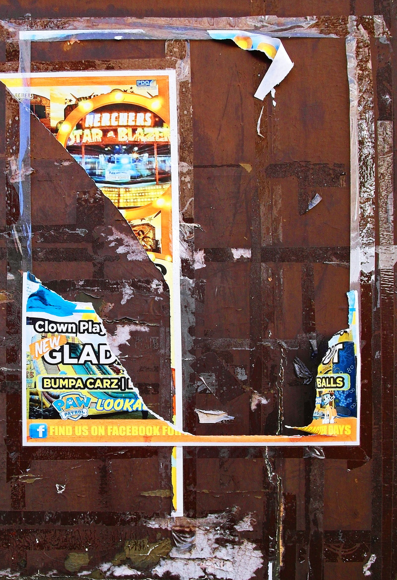 label, sticker, collage, alcohol, no people, abandoned, flyer, beverage, outdoors, shipping container, graffiti, brochure, rusty, paper, deterioration