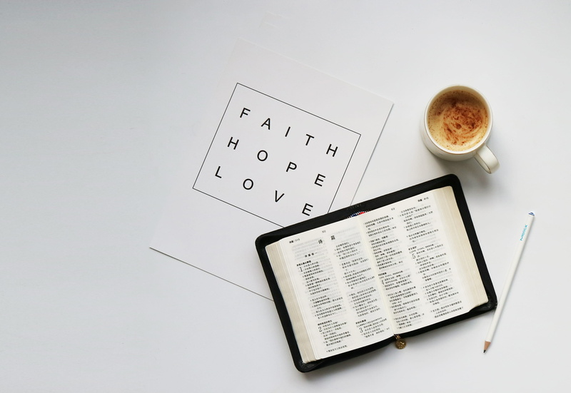 communication, calendar, indoors, leisure activities, label, pottery, hope, musical instrument, saucer, grand piano, cup, publication, holy bible, love