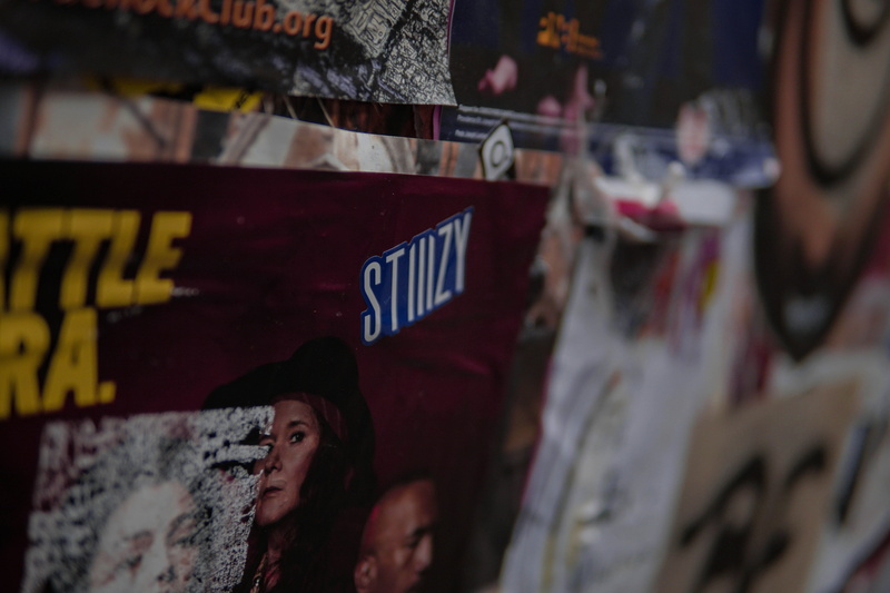selective focus, spoke, script, no people, wall, machine, wall - building feature, architecture, advertisement, retail, flyer, stiizy, tire, word, hardhat