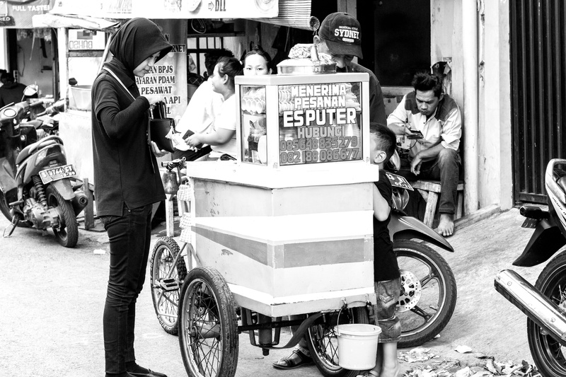 clothing, town, photo, human, vehicle, hoodie, text, tricycle, indonesia, land vehicle, outdoors, spoke, leisure activity, motorcycle, street, surabaya