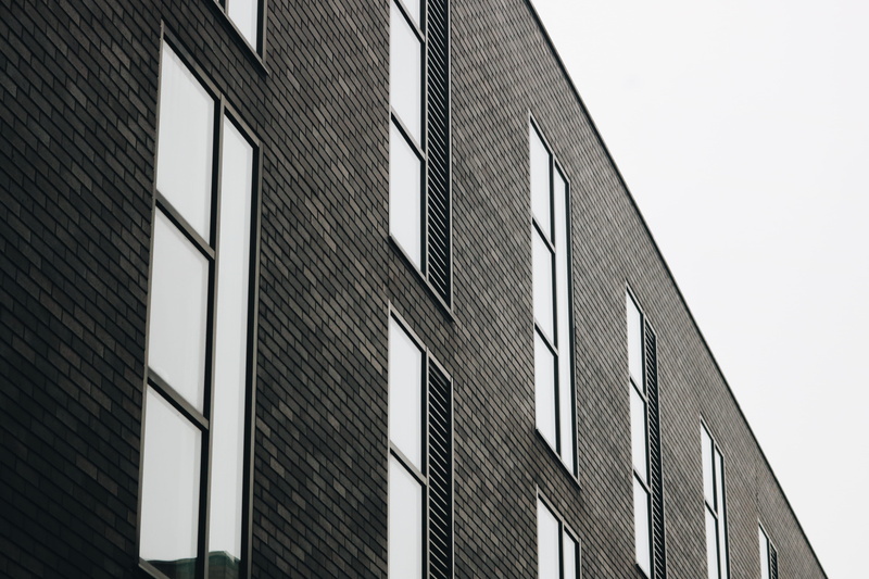 condo, simple, low angle view, apartment building, concrete, sky, day, building, manchester, 4K, built structure, clear sky, boundary, modern, fence, high rise