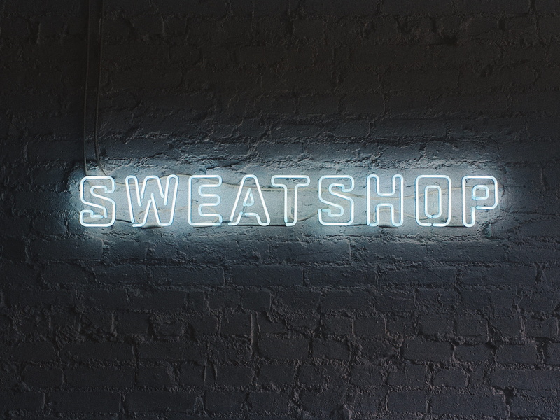 message, capital letter, sign, light sign, script, sweatshop, western script, brick wall, no people, architecture, neon sign, neon, close-up, text, light