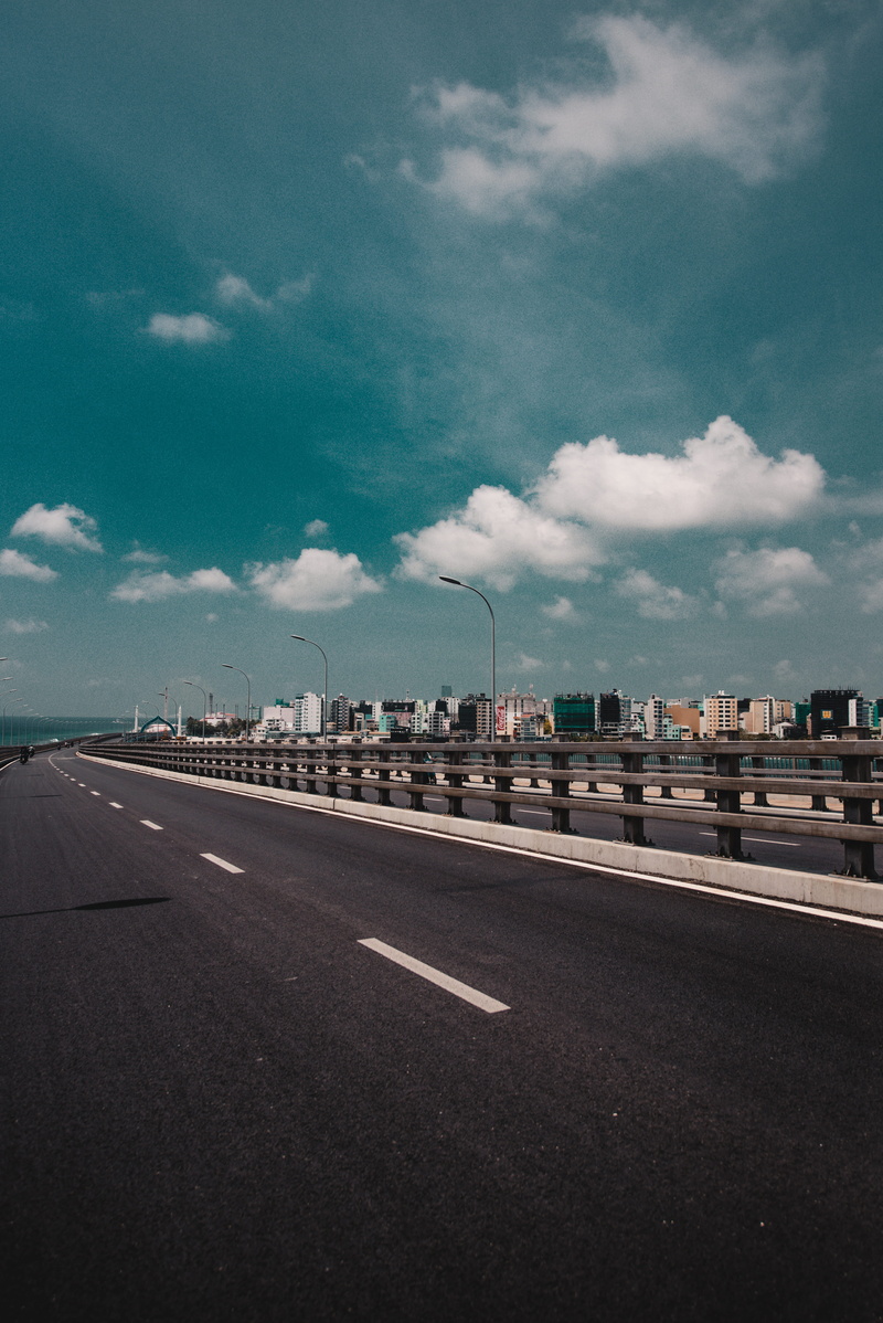 the way forward, built structure, building, sign, navy, symbol, mode of transportation, cloud - sky, road marking, banister, vehicle, ship, architecture