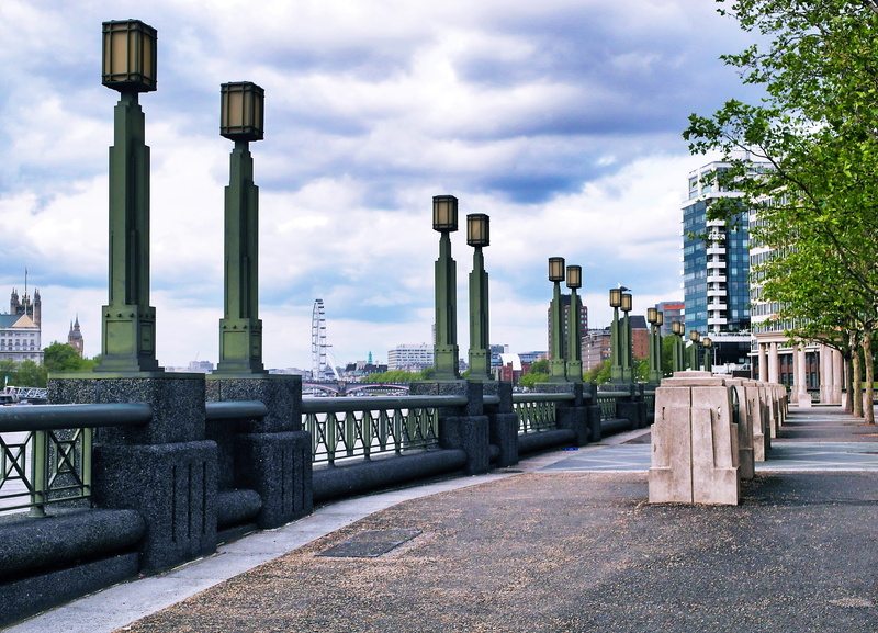 architectural column, street, road, the past, tarmac, building, walkway, day, handrail, nature, pavement, railing, plant, water, sky, waterfront, path