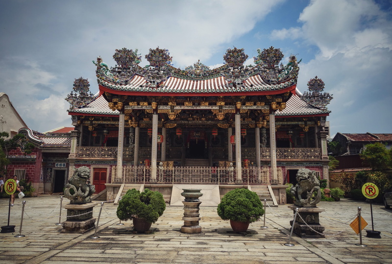 outdoors, urban, sky, day, metropolis, nature, clothing, plant, flagstone, blue, tree, place of worship, roof, city, travel, pagoda, architecture, building