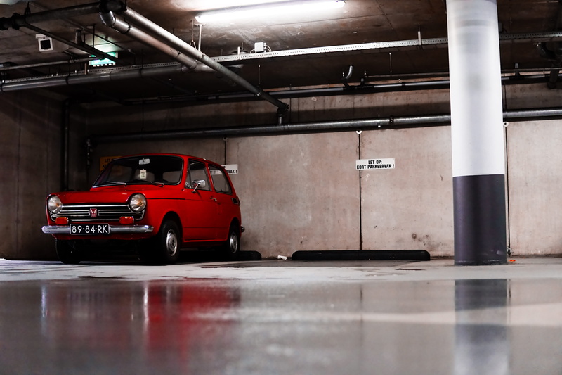 ceiling, 5K, floor, built structure, parking, no people, door, communication, garage, motor vehicle, parking garage, land vehicle, indoors, basement, headlight