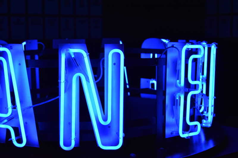 electricity, text, neon, night, lighting equipment, glowing, connection, black background, business, no people, illuminated, computer, blue, turned, led