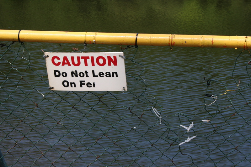 western script, fall, chainlink fence, funny, joke, metal, warning, sign, barrier, protection, donegal, accident, text, day, no people, humour, information sign
