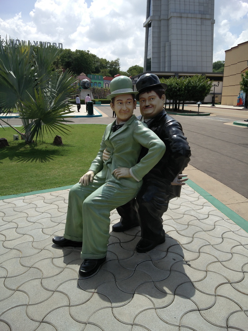 smiling, males, men, outdoors, child, amusing, humorous, boys, funny, footpath, togetherness, character, laughter, 4K, people, full length, statue, real people
