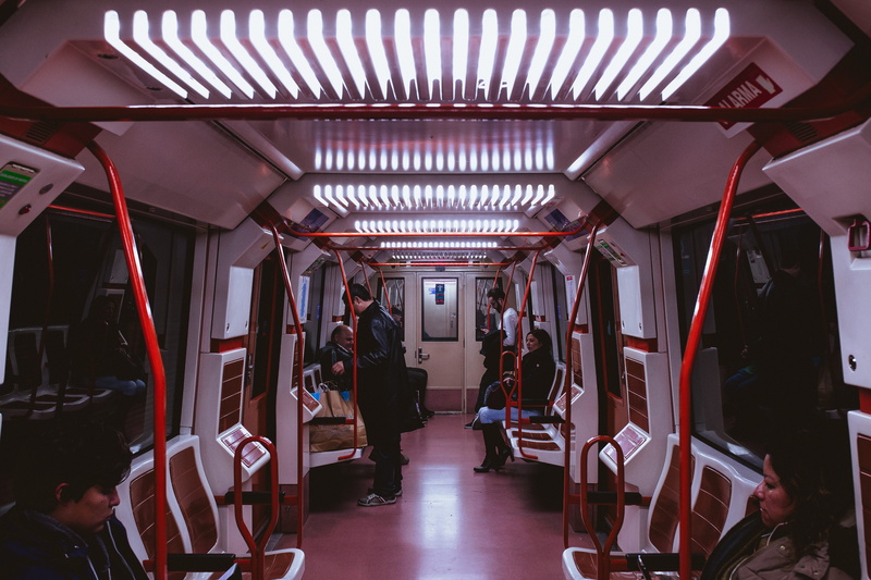 real people, group of people, train, mode of transportation, empty, people, illuminated, seats, vehicle seat, rail transportation, subway train, vehicle interior