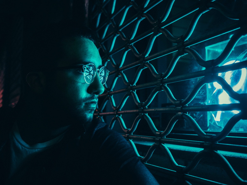 portrait, blue, eyeglasses, indoors, headshot, leisure activity, mid adult, shadow, adult, metal, illuminated, looking, lifestyles, glasses, man, thru