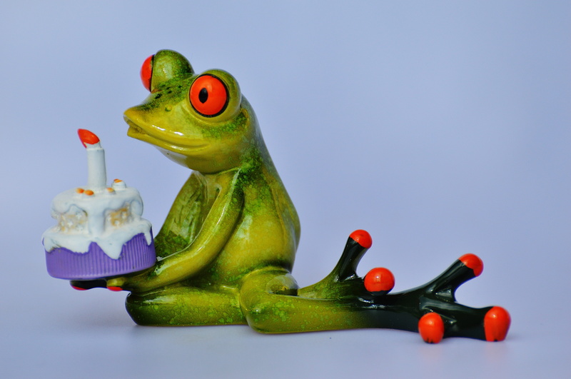 vegetarian food, vegetable, candle, indoors, toy, animal representation, green color, blue background, no people, luck, food, Happy Birthday, birthday cake