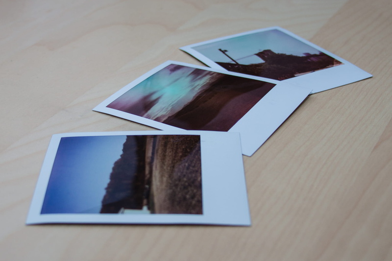 focus on foreground, group of objects, reflection, photography themes, high angle view, indoors, polaroid film, table, still life, freshness, food and drink