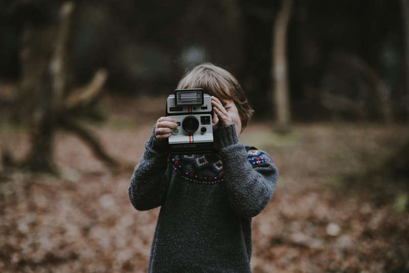 photographing, 8K, portrait, kid, leisure activity, holding, polaroid, camera, warm clothing, childhood, outdoors, child, women, activity, blond hair