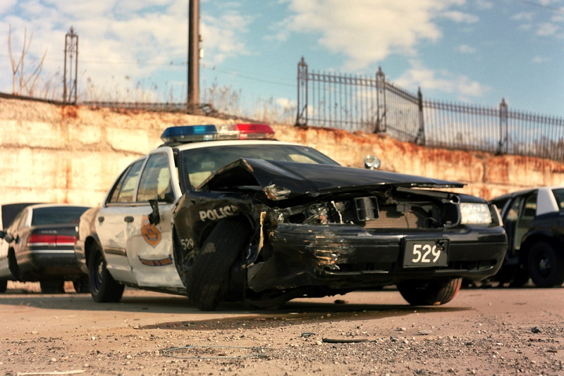 day, focus on foreground, damaged, cop, car crash, motor vehicle, mode of transportation, cruiser, travel, no people, wreck, parked, black, emergency, sky
