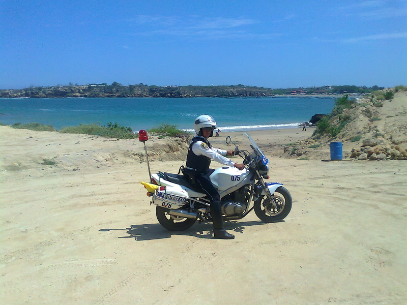 2K, sky, full length, transportation, day, summer, leisure activity, riding, motorcycle, sunlight, helmet, Ecuador, one person, outside, nature, beauty in nature