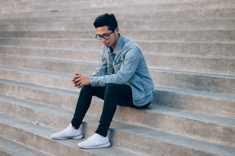 person, looking, staircase, casual clothing, steps and staircases, outdoors, concrete, lifestyles, sneakers, young adult, full length, men, portrait, city