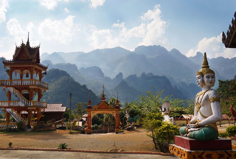 religion, sculpture, vang, art and craft, human representation, built structure, belief, no people, cloud - sky, idol, vieng, spirituality, building, buddhist