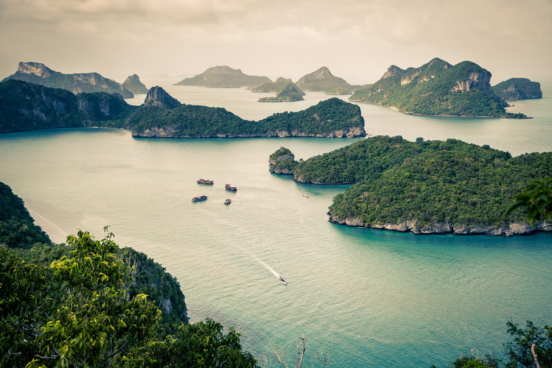 high angle view, forest, outdoors, water, mode of transportation, day, mountain, mointains, transportation, thailand, tranquil scene, sky, no people, beach