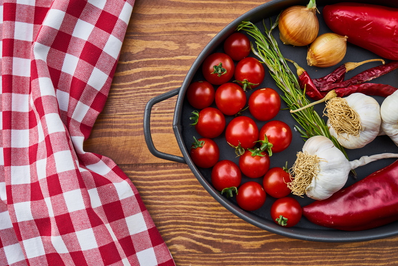nutrition, cooking, wood - material, still life, from above, tomatoes, table, checked pattern, black, chillies, traditional, rosemary, food and drink, no people