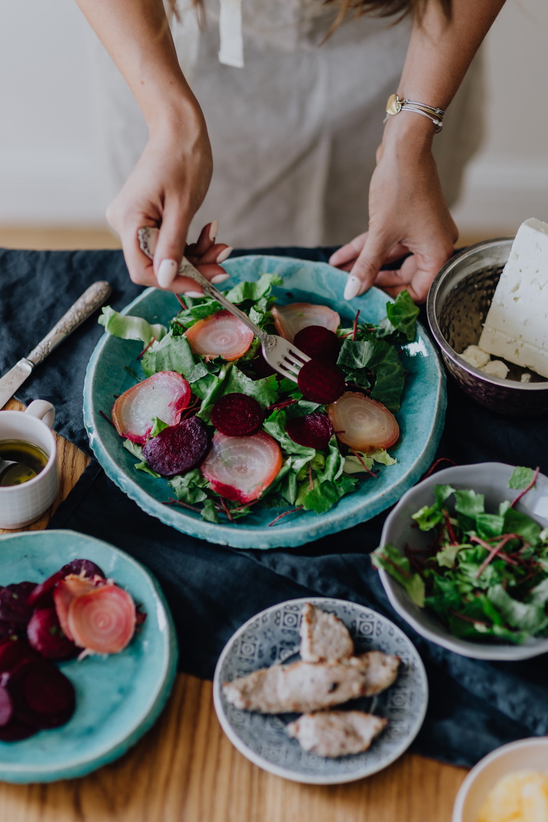 vegan, yummy, lifestyles, vegetables, one person, hand, freshness, salad, indoors, fruit, preparation, preparing, wellbeing, human body part, vegetable