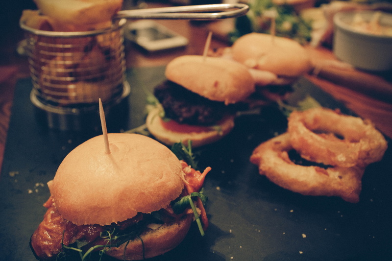 no people, focus on foreground, united kingdom, hot dog, dinner, fast food, food and drink, hamburger, plate, food, burger, serving size, close-up, sandwich