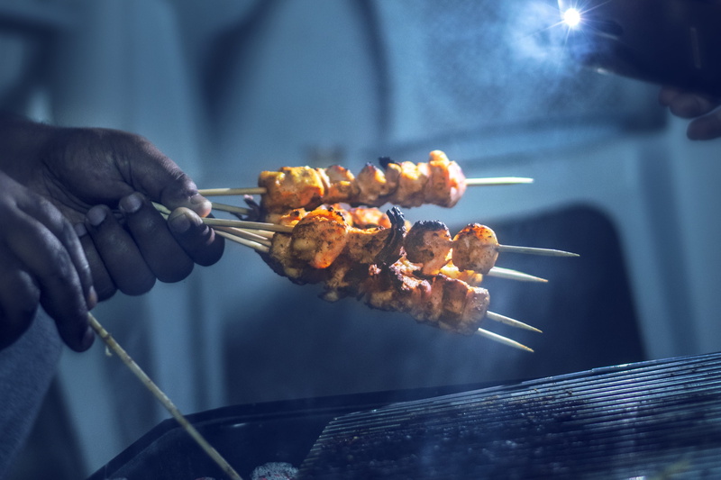 human hand, barbecue grill, food, bbq, grilling, skewer, meat, heat - temperature, unrecognizable person, holding, smoke - physical structure, chicken meat