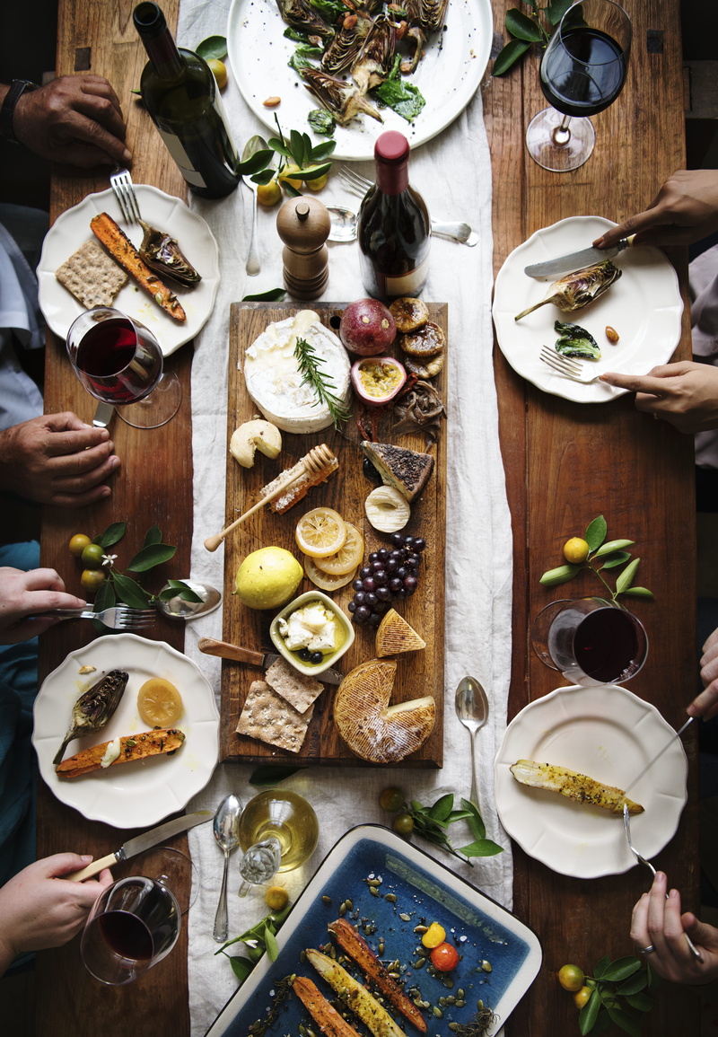 wine glasses, recipes, real people, hands, table, wood, several, wine, cuisine, flat lay, group of people, wooden table, grapes, holding, lifestyles, drink
