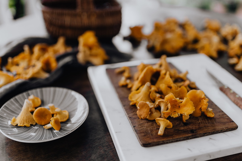 food, chantarelle, picking, focus on foreground, table, selective focus, 4K, eating utensil, mushrooms, wood - material, woods, plate, indoors, food and drink