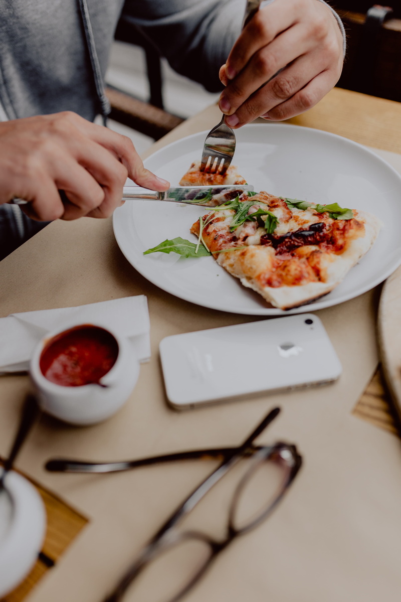 meal, food and drink, eating, restaurant, cheese, women, real people, human body part, business, italian, lifestyles, food, hungry, dinner, italian food