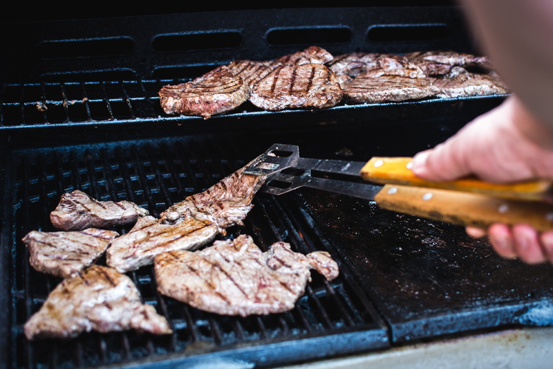 steaks, steak, paleo, one person, red meat, barbecue, preparing food, close-up, meal, grilling, grilled, outside, human body part, cooking, meat, barbecue Grill
