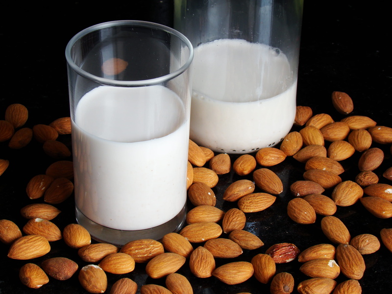 veggie milk, black background, healthy eating, refreshment, large group of objects, 2K, still life, dairy product, no people, vegetarian, table, almond