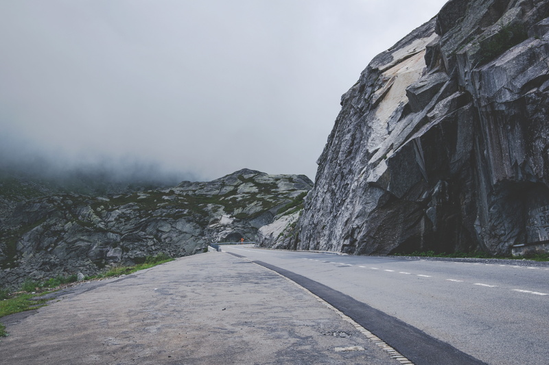 road, environment, cloud - sky, scenics, the way forward, direction, transportation, cross, weather, beside, rock, concrete road, pass road, landscape