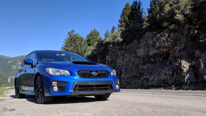 tree, mountain pass, day, land vehicle, formation, motor vehicle, shadow, sunlight, Subaru WRX, outdoors, mode of transportation, sky, clear sky, car, Subaru
