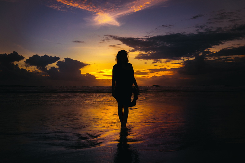sunset, walking, shore, sea, coast, nature, vacations, beauty in nature, leisure activity, sky, 4K, alone, trip, orange color, land, woman, horizon over water